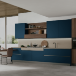 The Stosa Infinity 08 kitchen stands out for its refined interplay of chromatic and tactile contrasts, combining deep, cool tones with the warmth of wood.