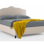 The Valery Bed by Gienne Group is an upholstered double bed model characterized by a 'timeless classic' style and essential, refined lines.